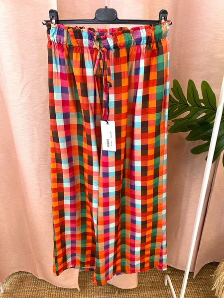 Calças pantalonas estampa quadrados coloridos