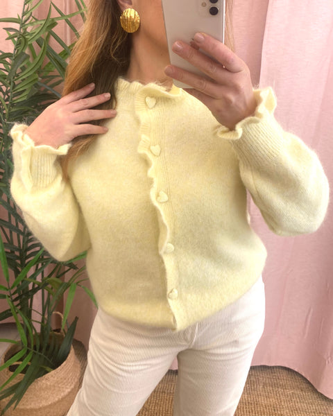 Casaco de malha amarelo com botões coração