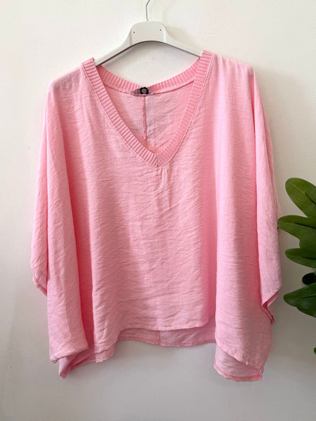 Blusa oversize crop rosa