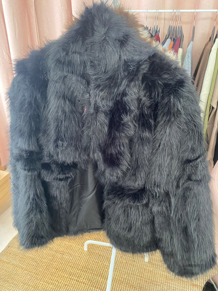 Casaco de pêlo preto