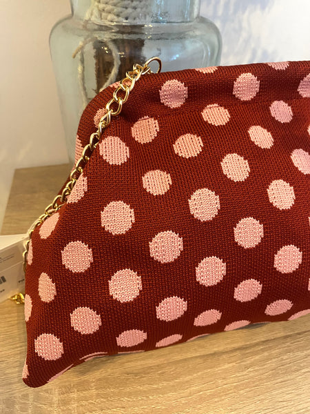 Clutch malha Bordeaux bolas rosa