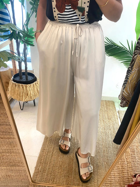 Calças pantalonas acetinadas lisas beje