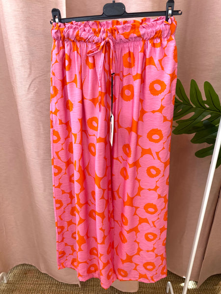 Calças pantalonas estampa flores rosa/laranja